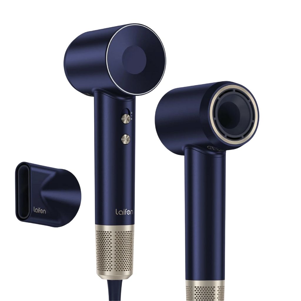 Navy blue hair dryer with gold accents and attachments on a white background