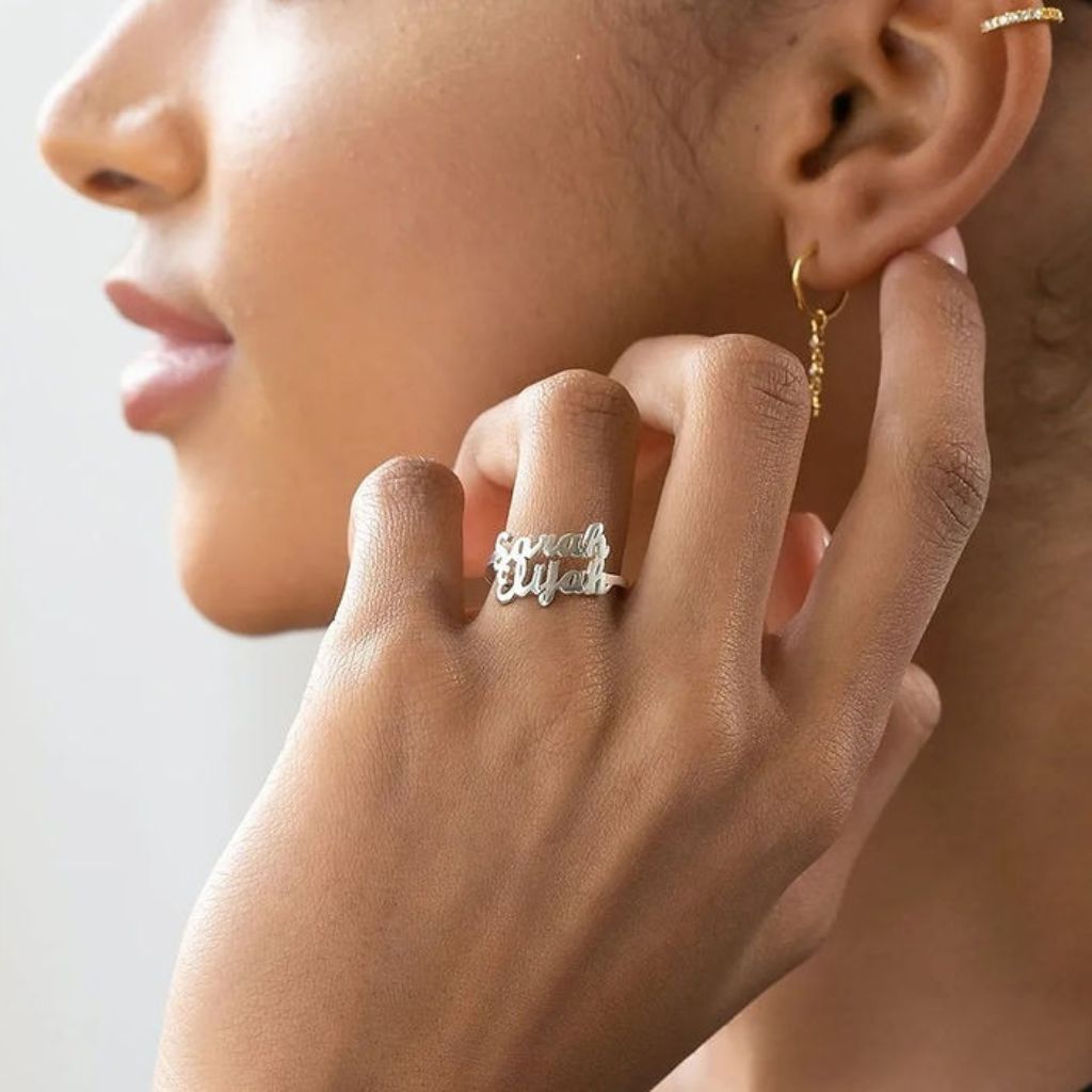 Silver ring with cut out letter