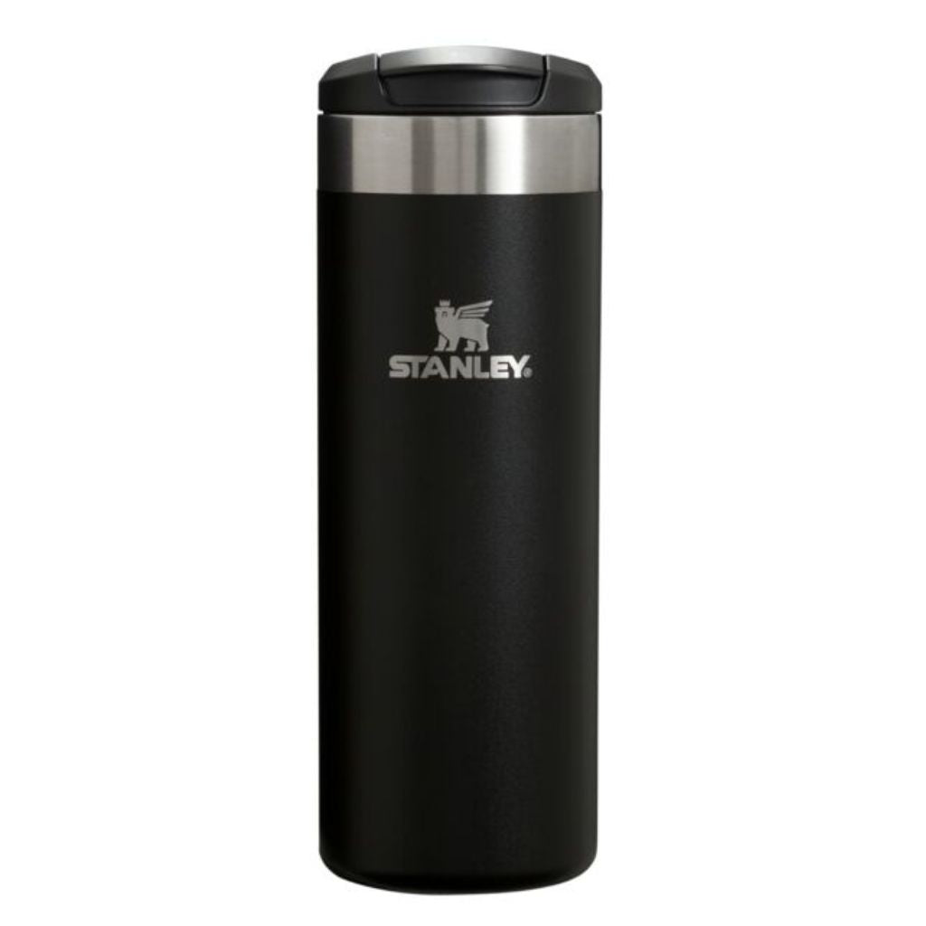 Black Stanley tumbler on a white background