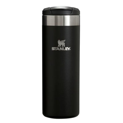 Black Stanley tumbler on a white background