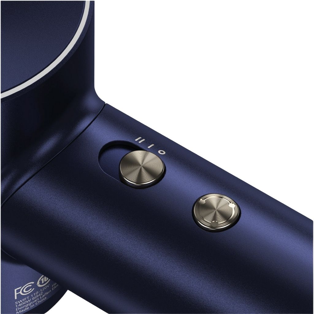 Close-up of a blue hair dryer with silver buttons on a white background