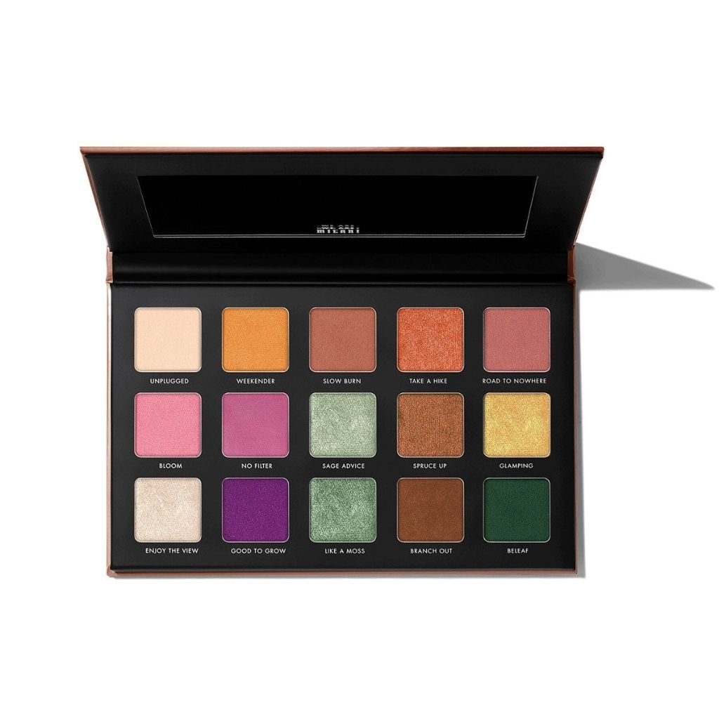 Makeup palette with various colors on a white background