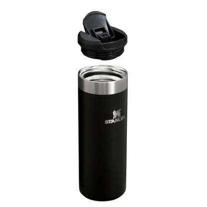 Black Stanley tumbler with a silver interior on a white background
