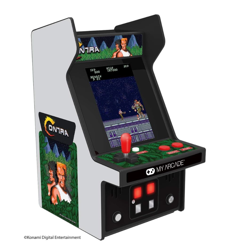 Miniature arcade machine with 'Ninja' game displayed on screen