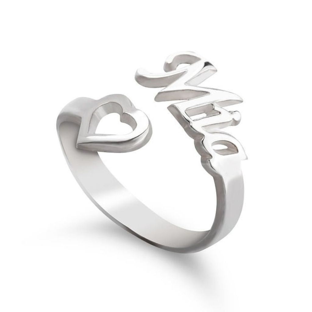 Silver ring with 'love' and heart design on a white background