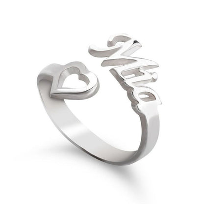 Silver ring with 'love' and heart design on a white background
