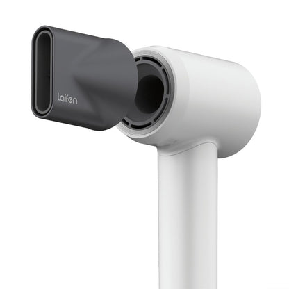 White hair dryer with a gray nozzle on a white background