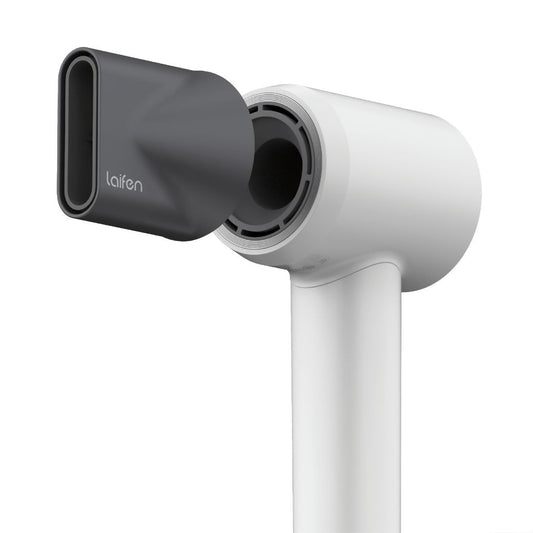 White hair dryer with a gray nozzle on a white background