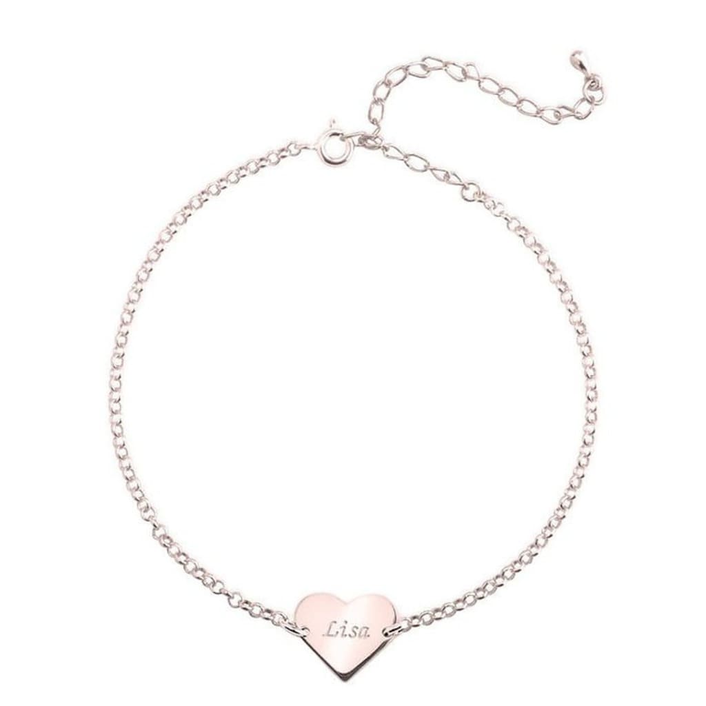Silver bracelet with a heart-shaped nameplate on a white background