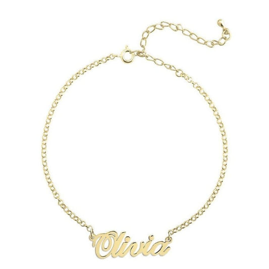 Gold bracelet with 'Olivia' engraving on a white background