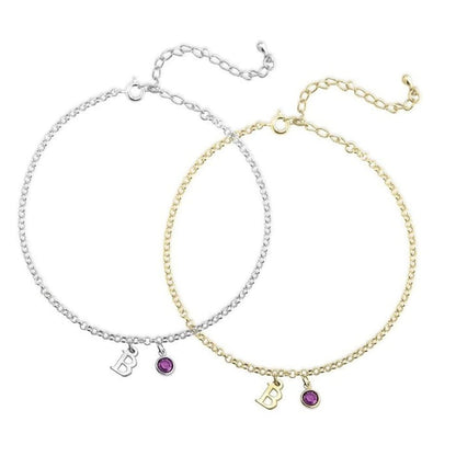 Two bracelets, one silver and one gold, with 'B' initials and purple gemstones on a white background.