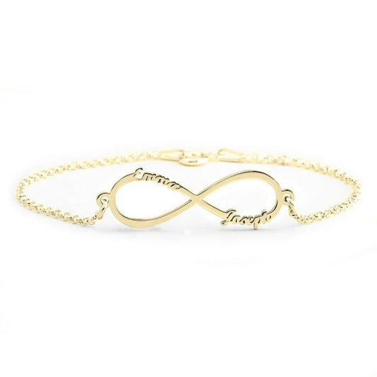Gold infinity bracelet on a white background