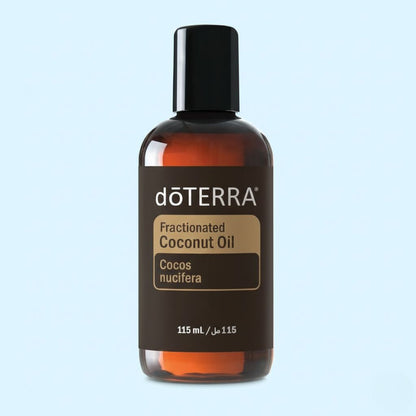 doTERRA Fractionated Coconut Oil bottle on a light blue background