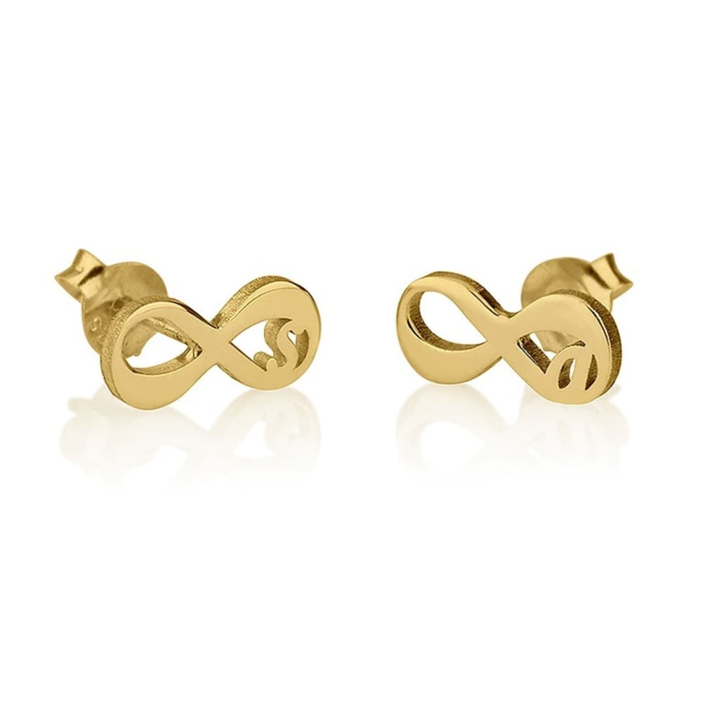 Gold infinity symbol earrings on a white background