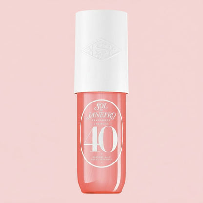 Perfume bottle with white cap and pink body on a light pink background