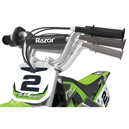 Close-up of a green and black toy dirt bike with 'Razor' branding on the handlebars.