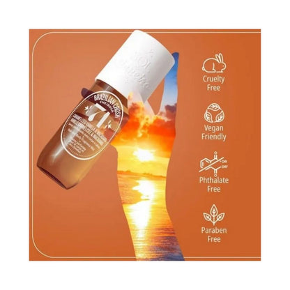 Bottle of Brazilian Crush hair product with sunset design and 'Cruelty Free', 'Vegan Friendly', 'Phthalate Free', and 'Paraben Free' icons on an orange background.