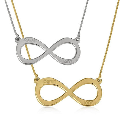 Two infinity necklaces, one gold and one silver, on a white background.