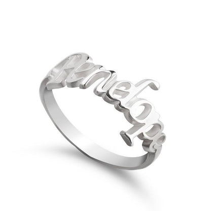 Silver ring with 'Amelie' engraved on a white background