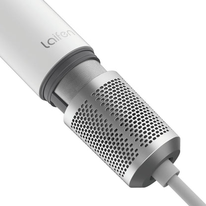 Close-up of a white microphone with a perforated design on a white background