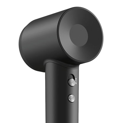 Black hair dryer on a white background