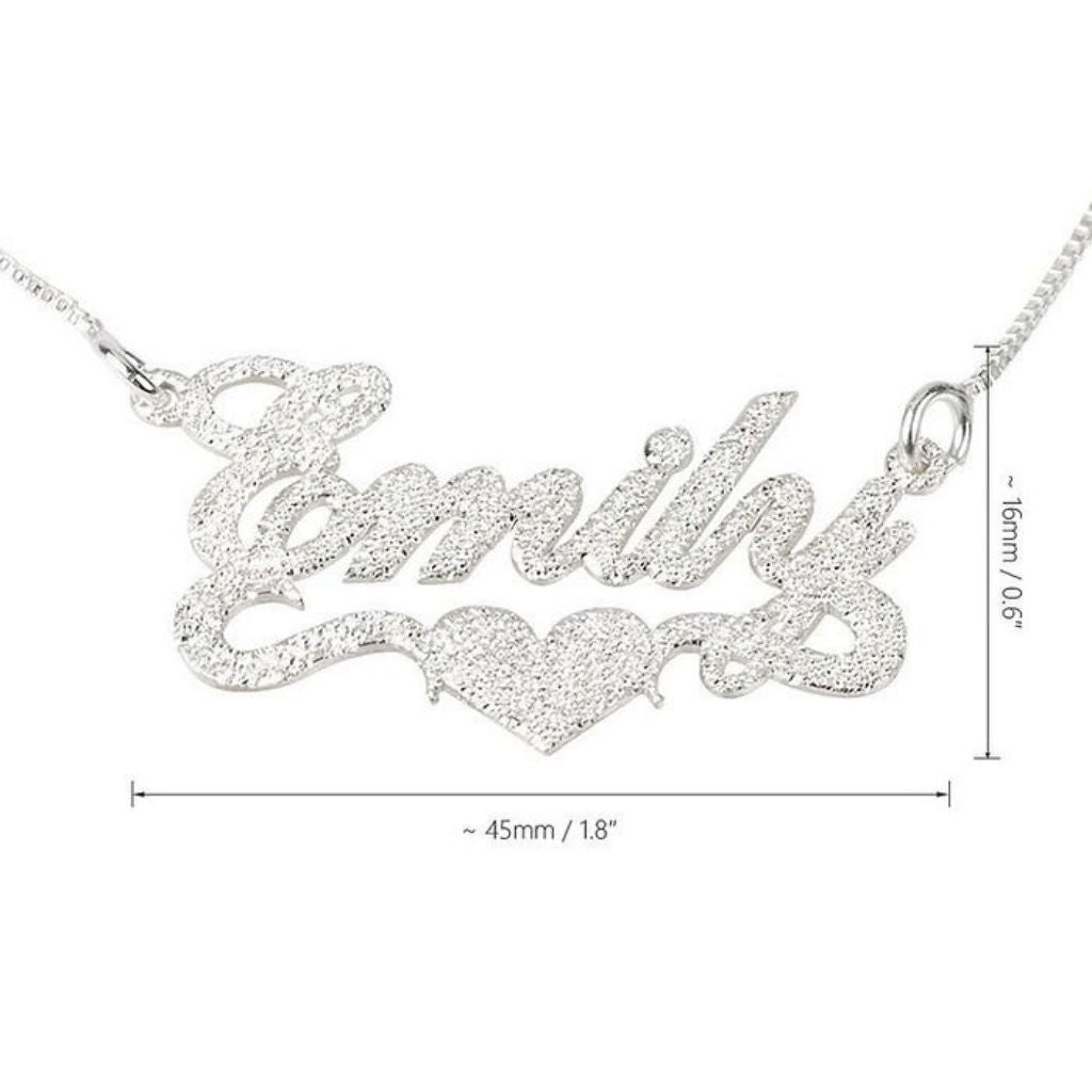 Silver name necklace with 'Smith' and a heart pendant, shown with measurements on a white background.