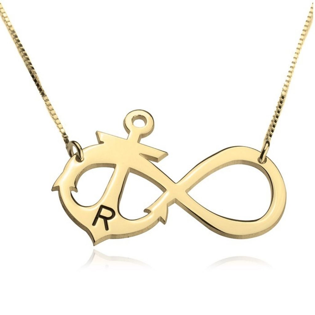 Gold necklace with an infinity symbol pendant on a white background