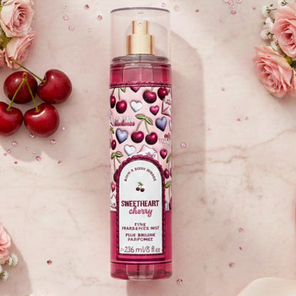 Body spray bottle with cherry design on a pink floral background