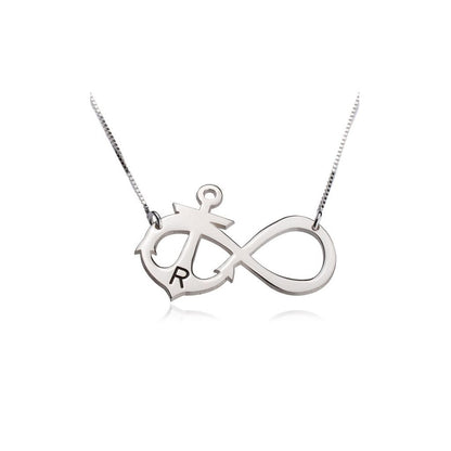 Silver necklace with an infinity symbol pendant on a white background