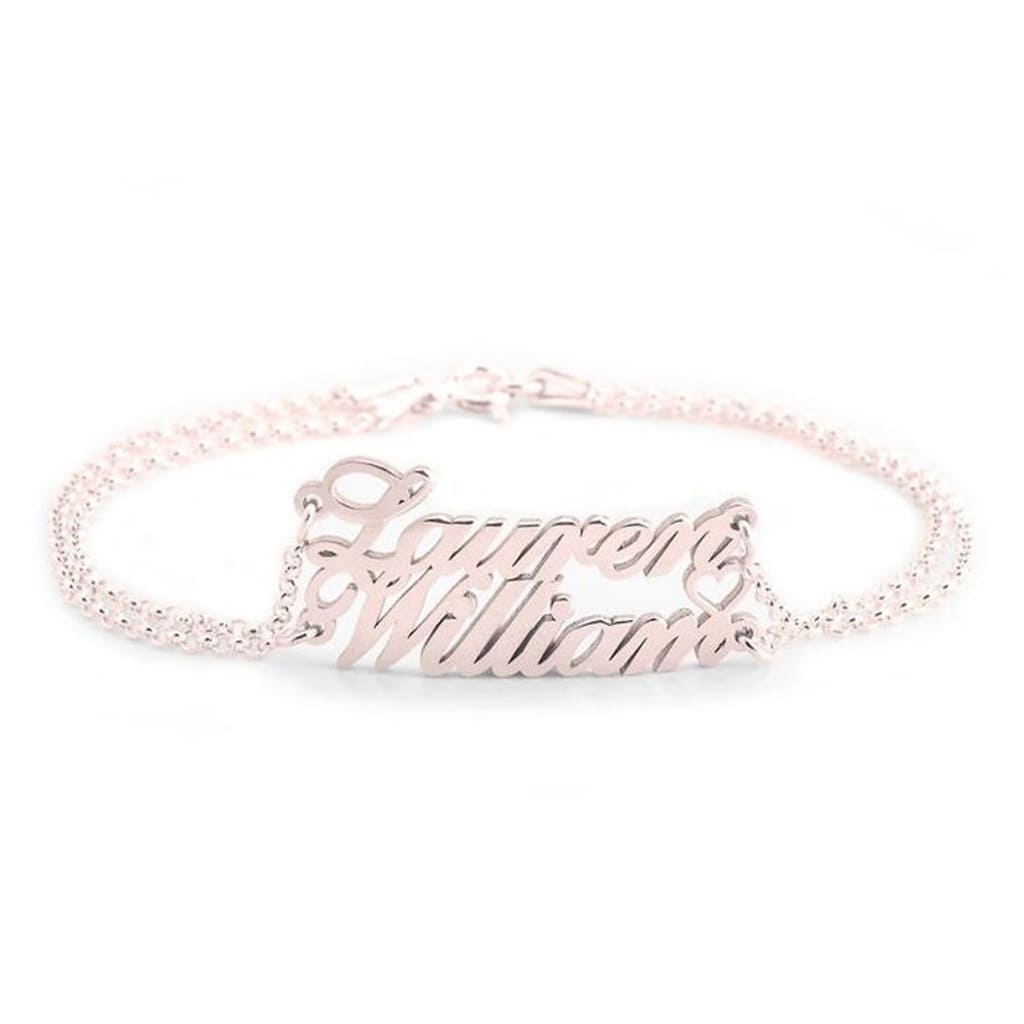 Rose gold bracelet with 'Laylene Williams' engraving on a white background