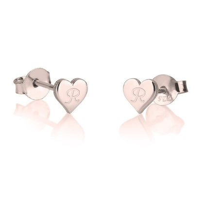 Heart-shaped earrings with initials on a white background