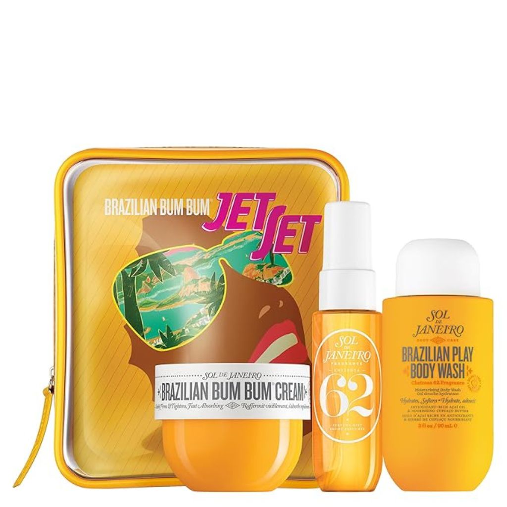 Collection of Sol de Janeiro beauty products including a cream, spray, and body wash in a 'Jet Set' themed tin.