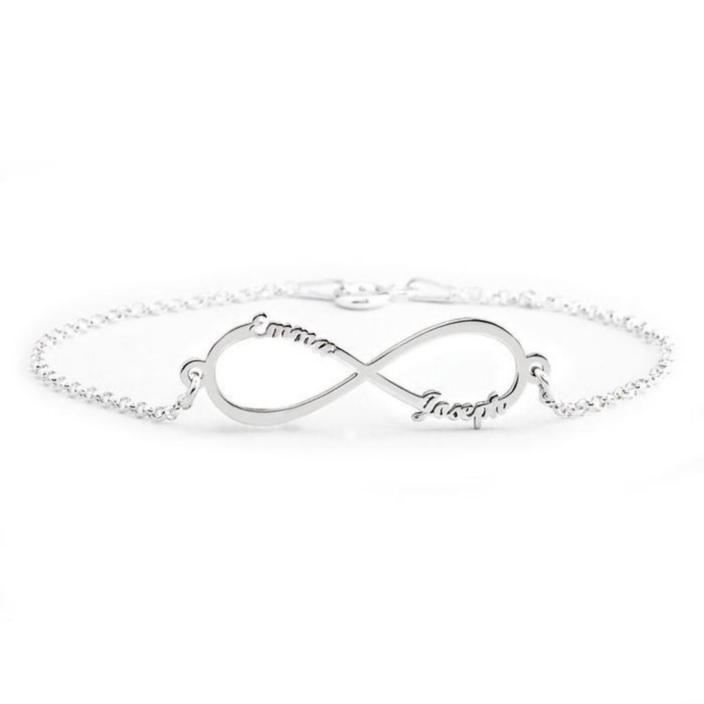 Silver infinity bracelet on a white background