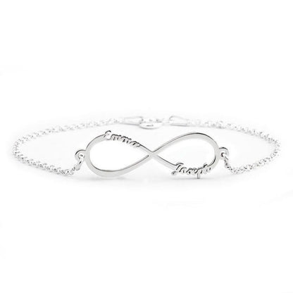Silver infinity bracelet on a white background