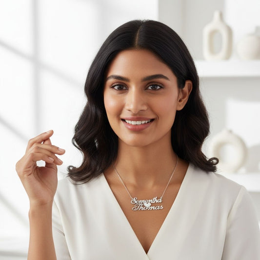 Woman wearing a name necklace with a blurred background