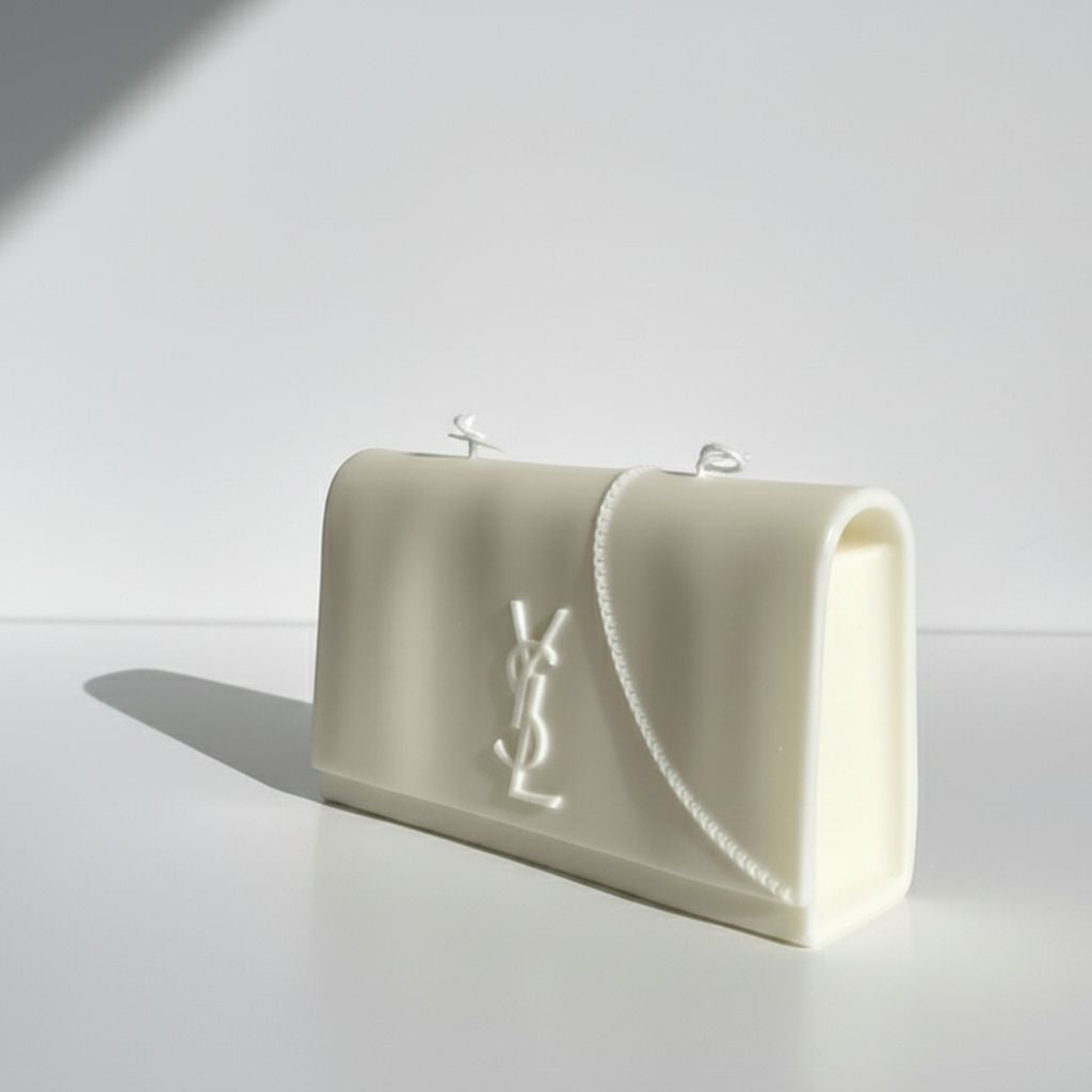White handbag with a brand logo on a light gray background