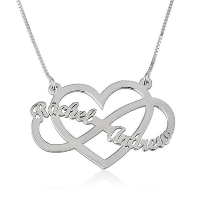 Silver necklace with interlocking hearts engraved with 'Rachel' and 'Andrew'.