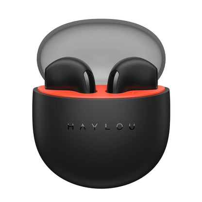 Black wireless earbuds in a transparent charging case on a white background