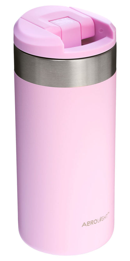 Pink insulated tumbler with a silver base on a white background