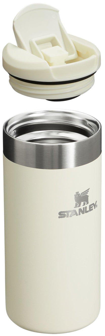 White Stanley tumbler with a lid on a white background