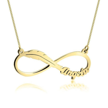 Gold infinity pendant necklace with 'Mom' engraved on a white background