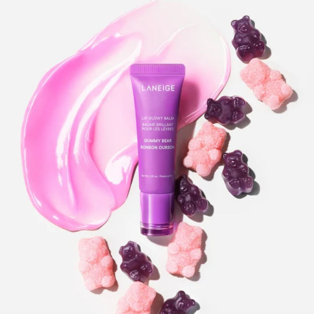 Laneige lip balm with pink and purple gummy bears on a white background