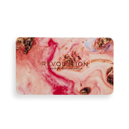 Makeup Revolution palette with pink and gold design on a white background