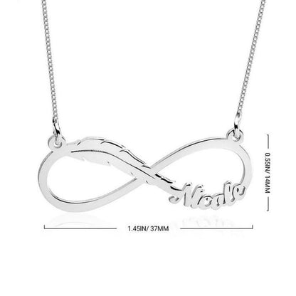 Silver infinity necklace with 'Nada' engraved on a white background
