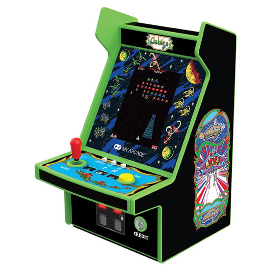 Miniature arcade machine with colorful graphics on a white background