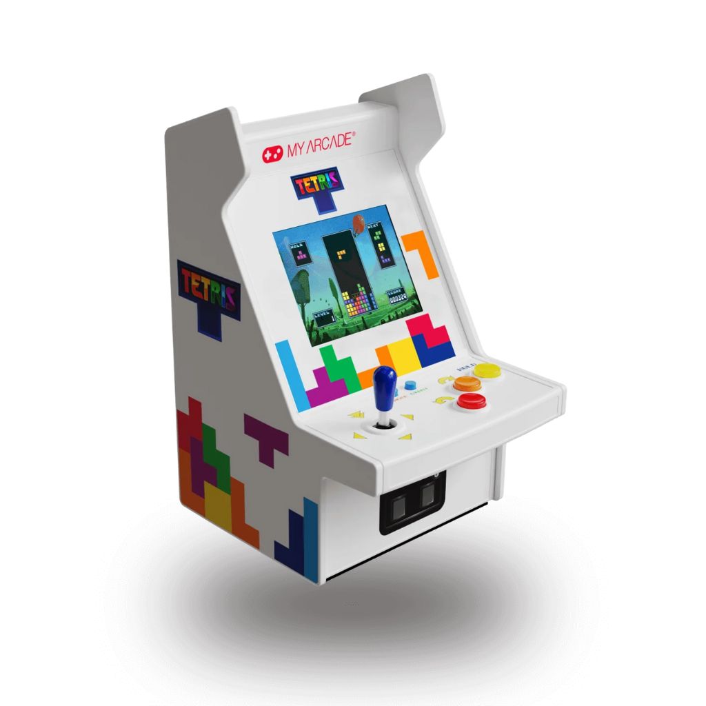 Miniature arcade machine with Tetris graphics on a white background