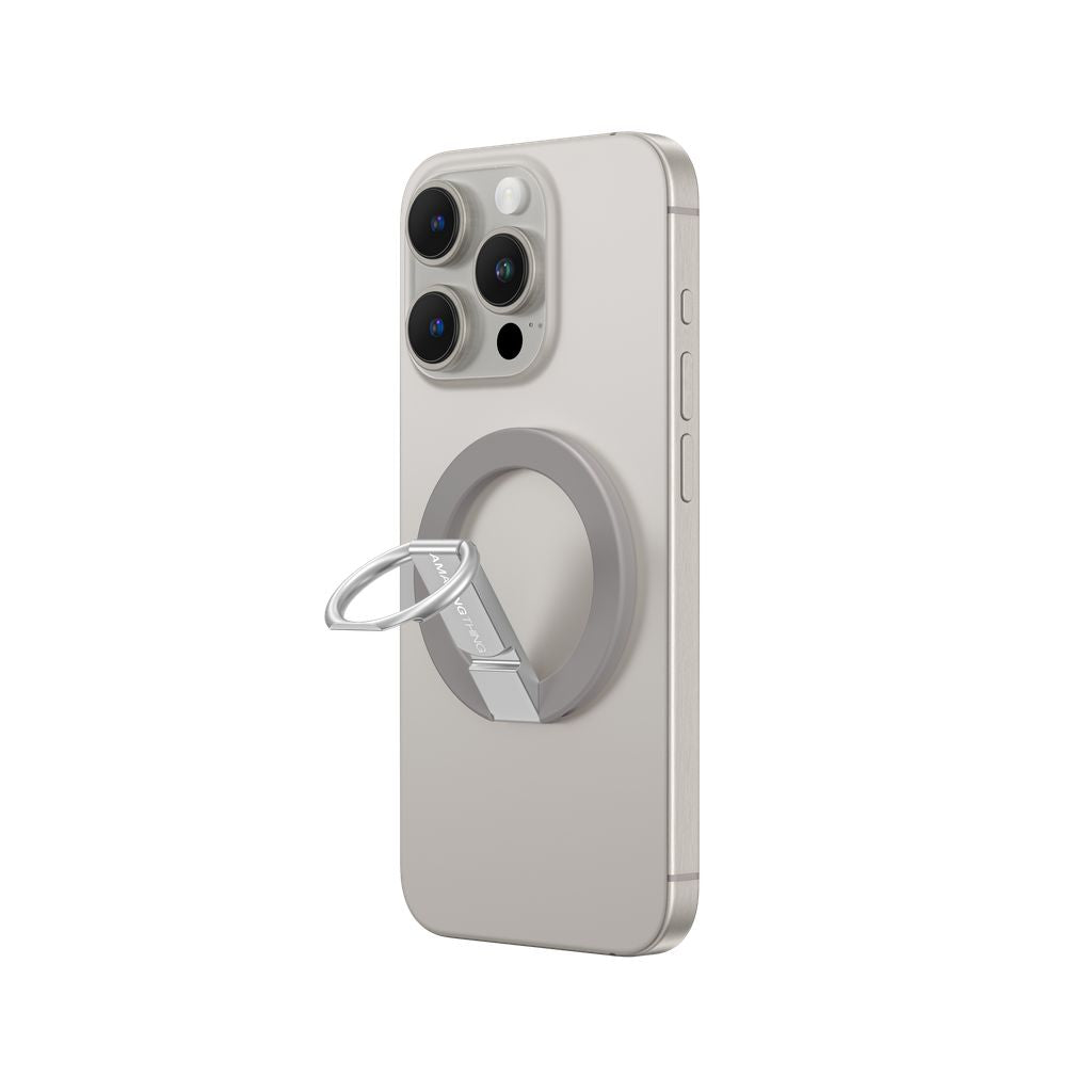 Smartphone with a magnetic ring holder on a white background