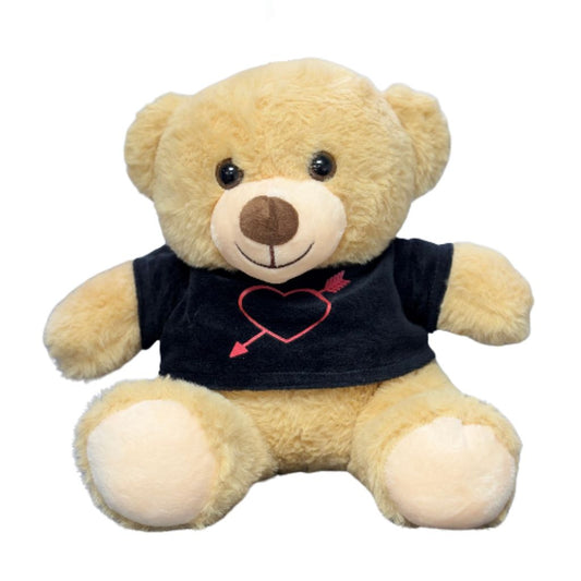 Plush teddy bear wearing a black t-shirt with a red heart design on a white background