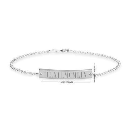 Silver bracelet with Roman numeral engraving on a white background