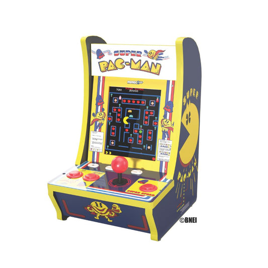 Miniature Pac-Man arcade machine with colorful design on a white background